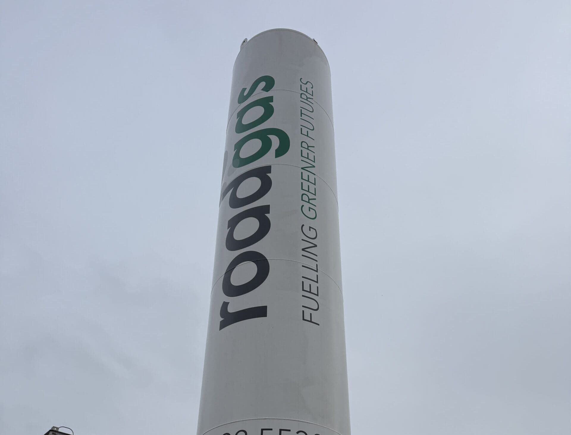 Roadgas sign promoting greener futures in renewable gas solutions