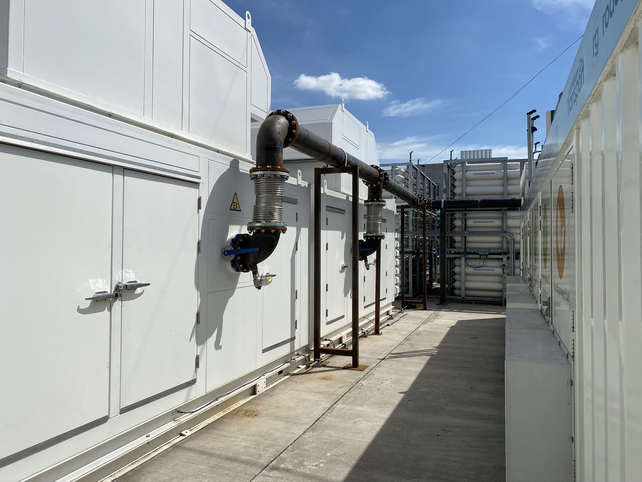 Image showing the exterior of renewable gas refuelling infrastructure with Bio-LNG and Bio-CNG supply systems for HGV fleets.